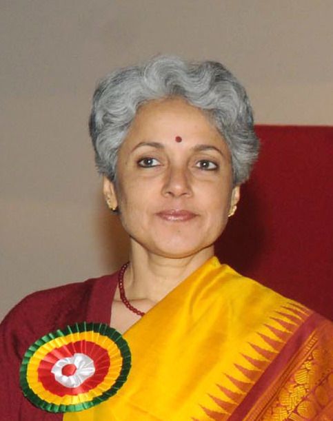 Soumya Swaminathan, in a yellow sari, at an event in New Delhi in 2016.